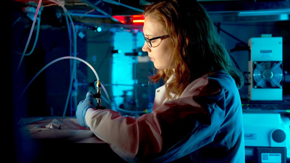 Heather Ricker, a Skidmore college student, conducts an experiment in a chemistry lab